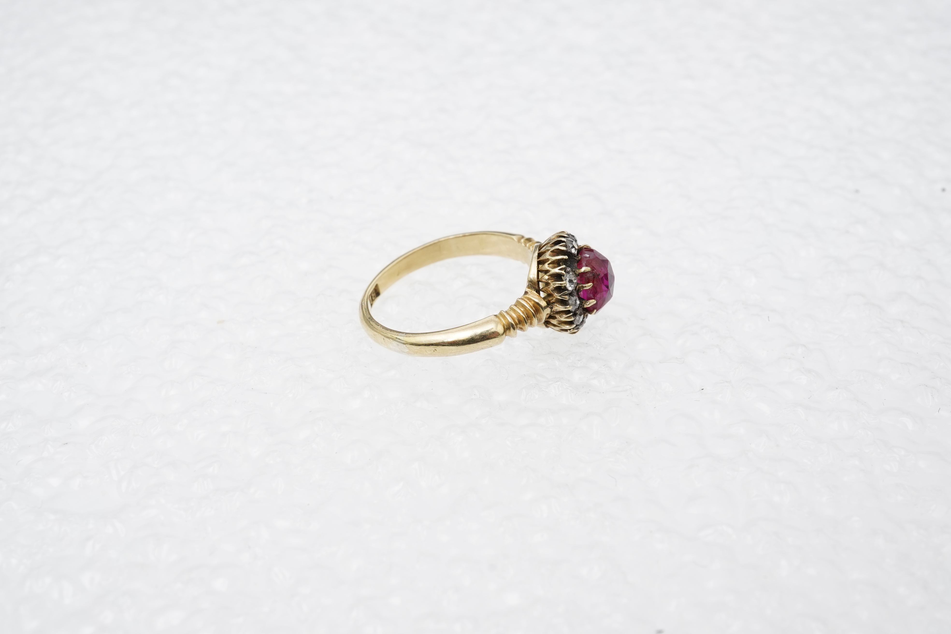 A ruby and diamond cluster ring, circa 1900